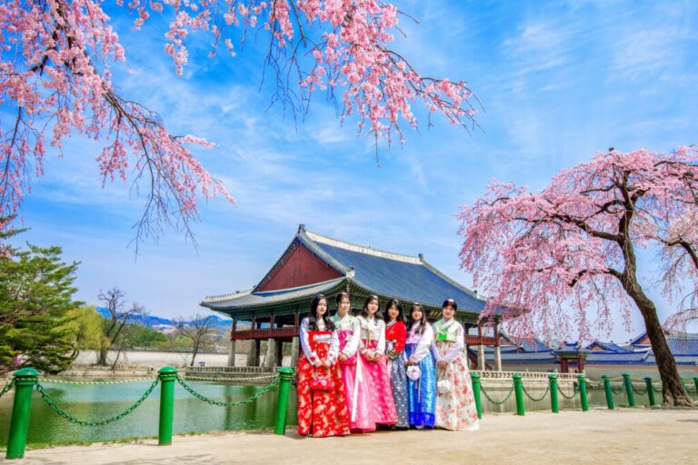 gyeongbokgung palace with cherry blossom spring tourists with hanbok dress 1024x682