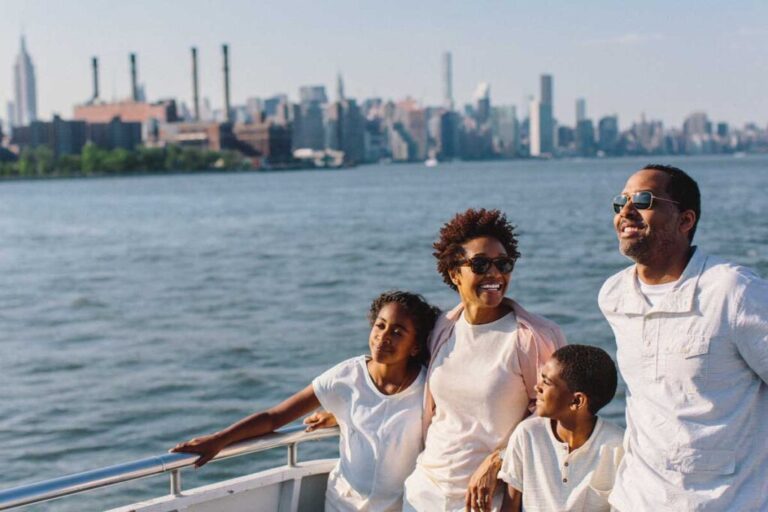 Family smiling on boat tour USE THIS ONE 1024x683