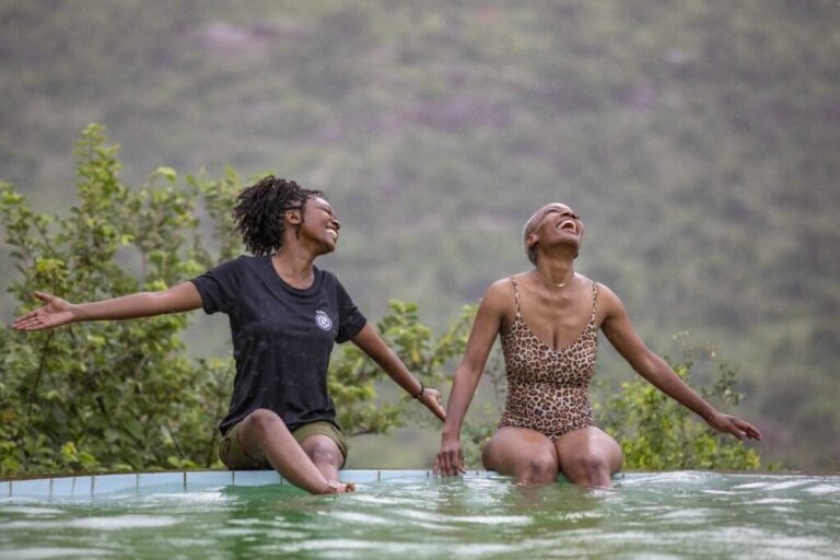 G Adventures Kenya Il Negwesi Lodge Geluxe CEO and female traveller on edge of pool MG 2040 1024x683