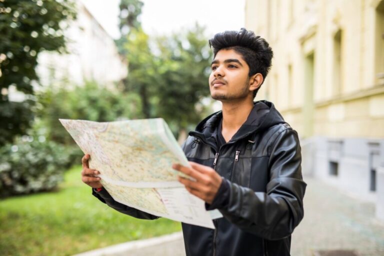 lost indian tourist looking city map trip 1024x683