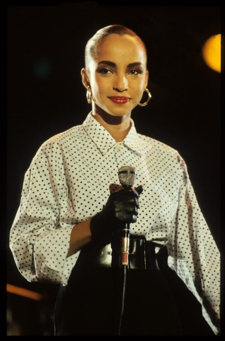 sade performs on stage